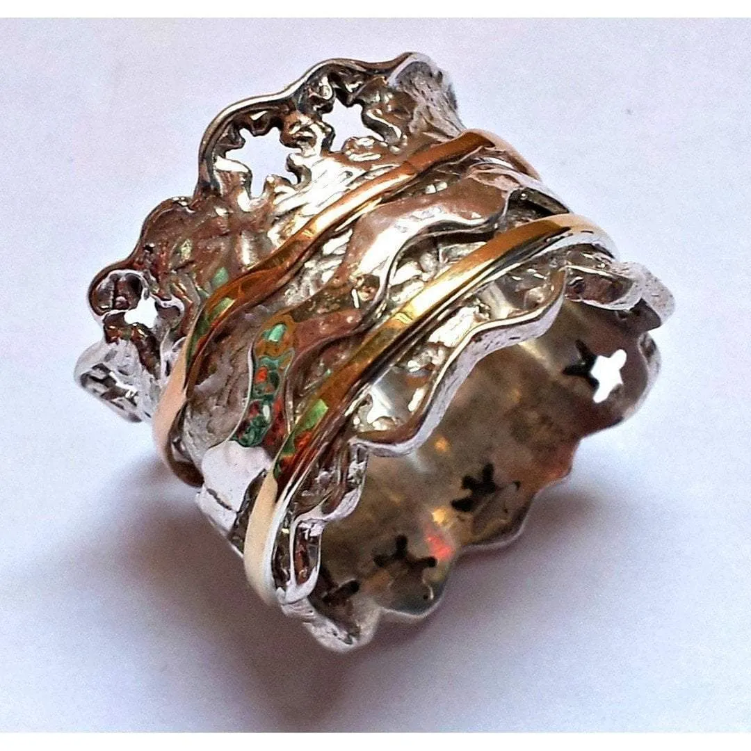 Spinning ring silver 9 ct gold. Floral spinner meditation ring.