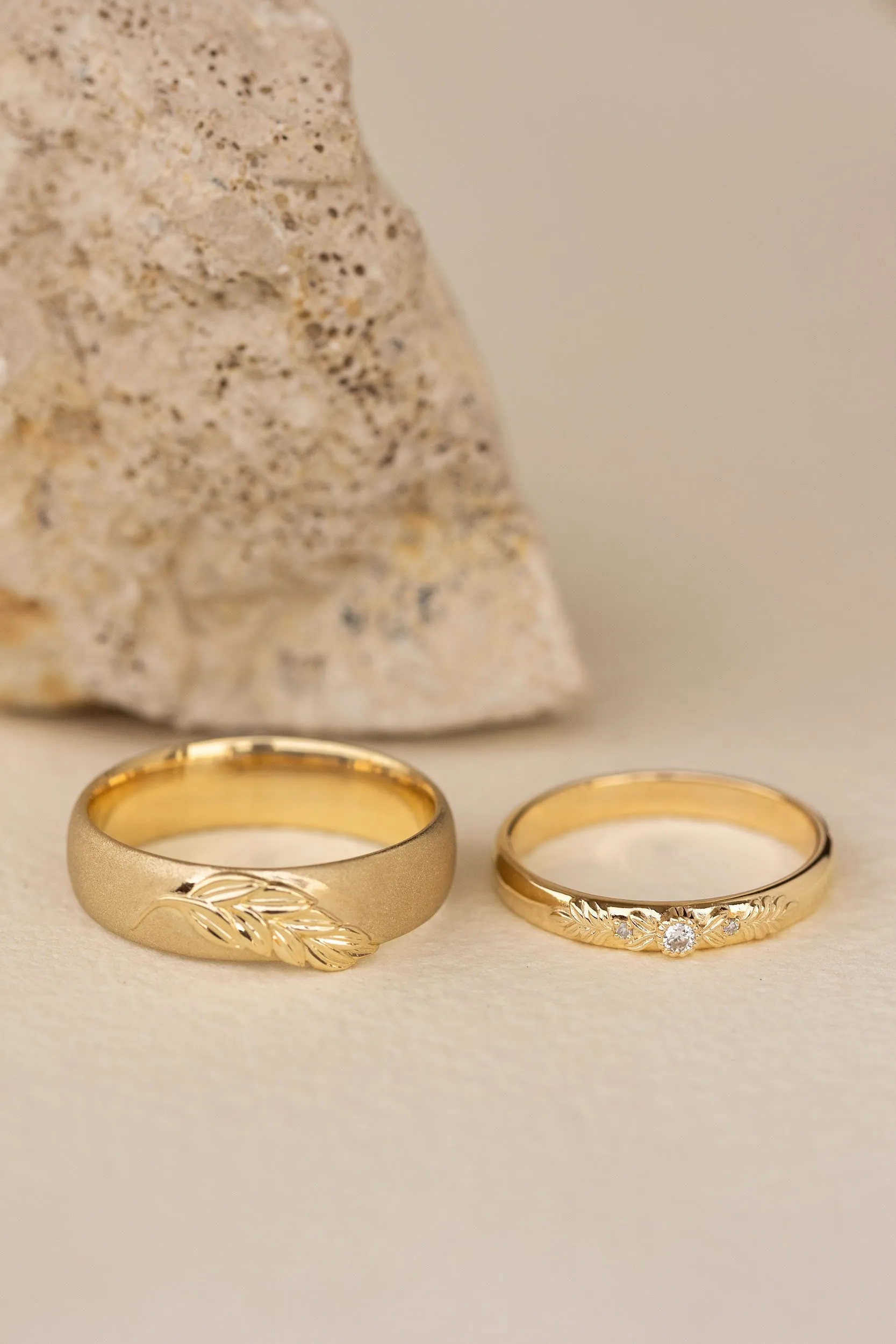 Wedding rings set for couples: satin band with palm leaf for him, wreath ring with gemstones for her