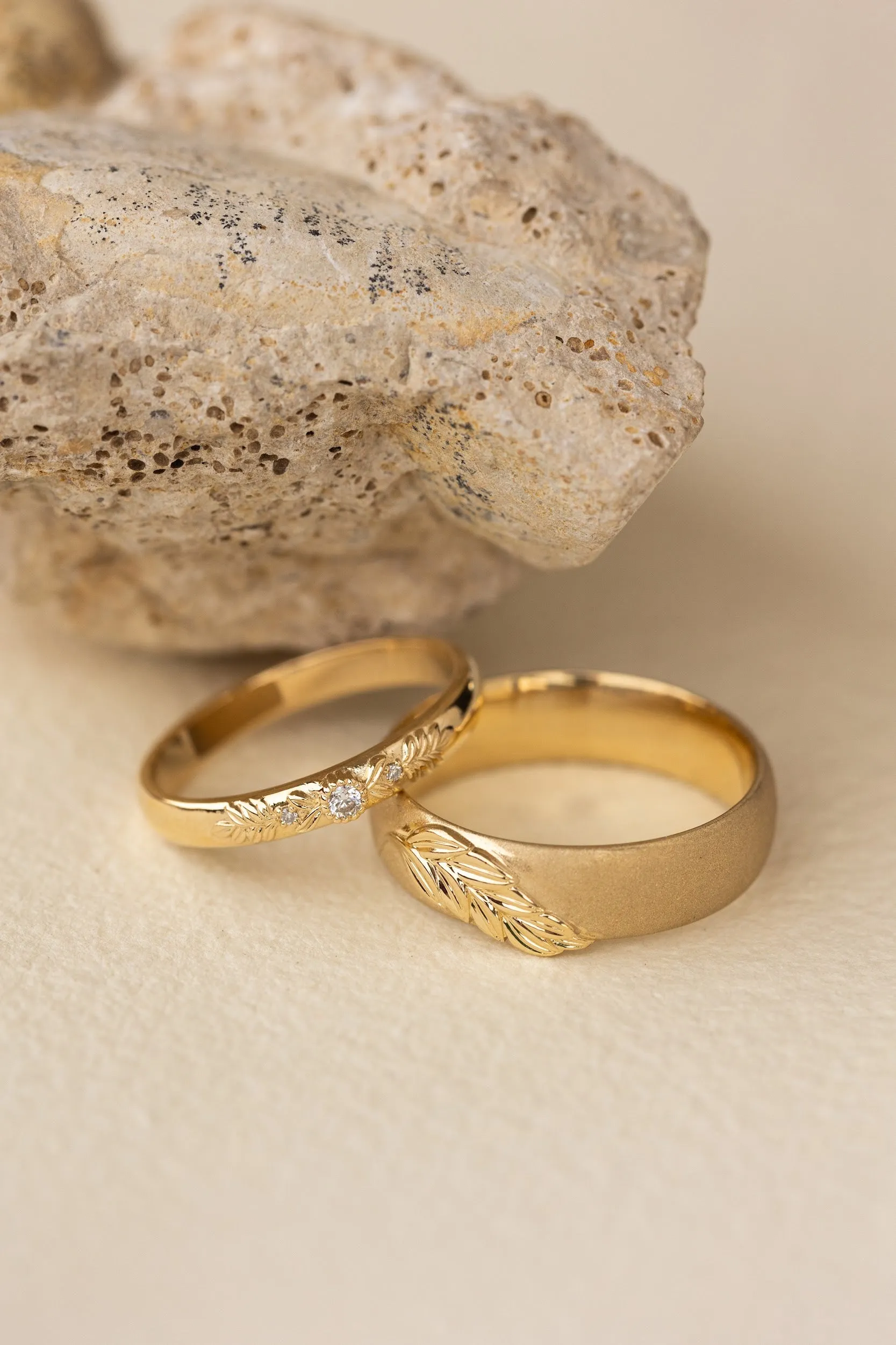 Wedding rings set for couples: satin band with palm leaf for him, wreath ring with gemstones for her